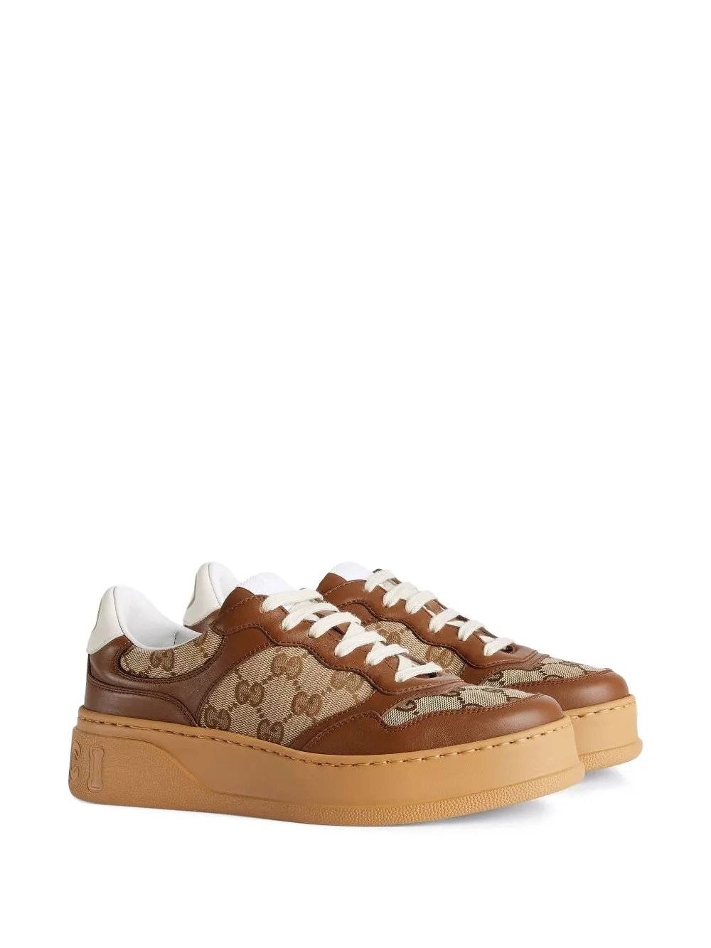Gucci GG embossed low-top sneakers detail view